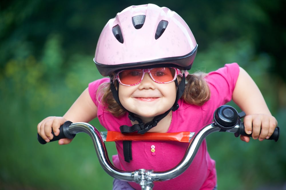 Girl on Bike - How Cyber Risk Management Is Like Buying a Bike for Your Daughter